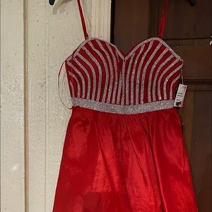 I’m selling Crystal Doll dresses from macy’s. It has bling bling